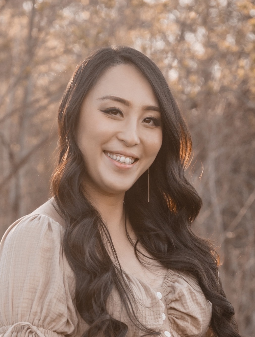 Yui Cunningham smiling outdoors
